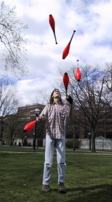 Bruce Juggling Five Clubs